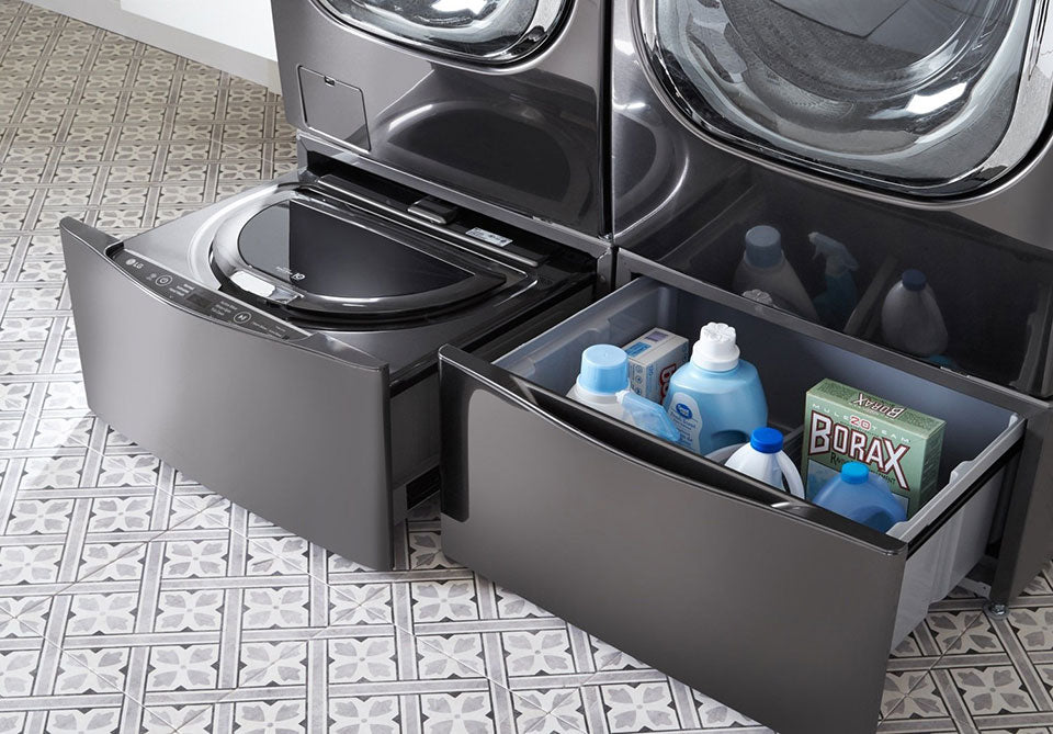 Laundry machine with storage drawer image