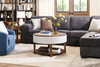 Elroy 33" Rustic Round Lift Top Coffee Table With Storage, Shelf and Casters - Brown and Grey with Fabric Edge|Table à café ronde rustique Elroy de 33 po avec dessus relevable, rangement, tablette et roulettes - brune et grise avec bordure en tissu