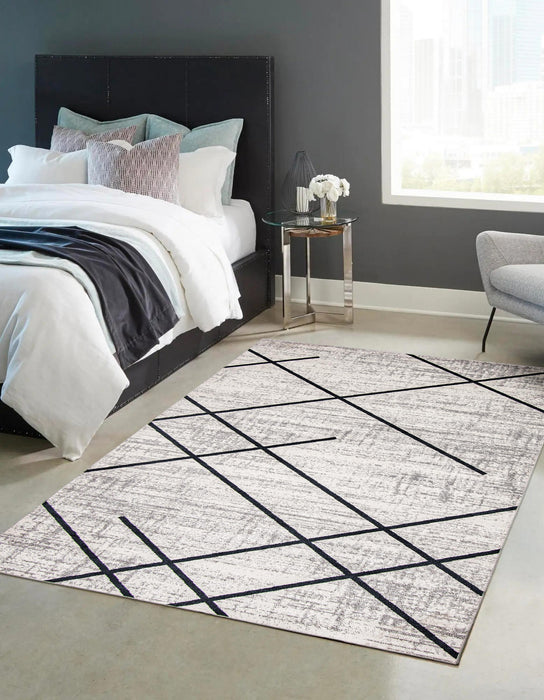 Damali Ivory/Blue Machine Washable Area Rug - 6'0\" x 9'0\"