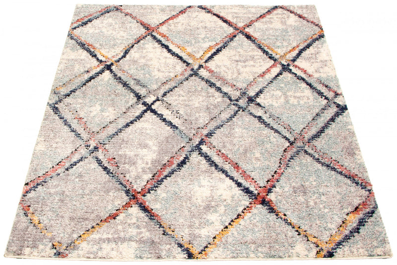 Makondo Abstract Ivory Area Rug - 6'7\" x 9'6\"