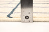 Taite Cream-Prol Area Rug - 3'11" x 5'7"