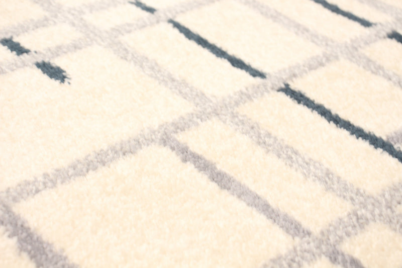 Taite Cream-Prol Area Rug - 3'11\" x 5'7\"