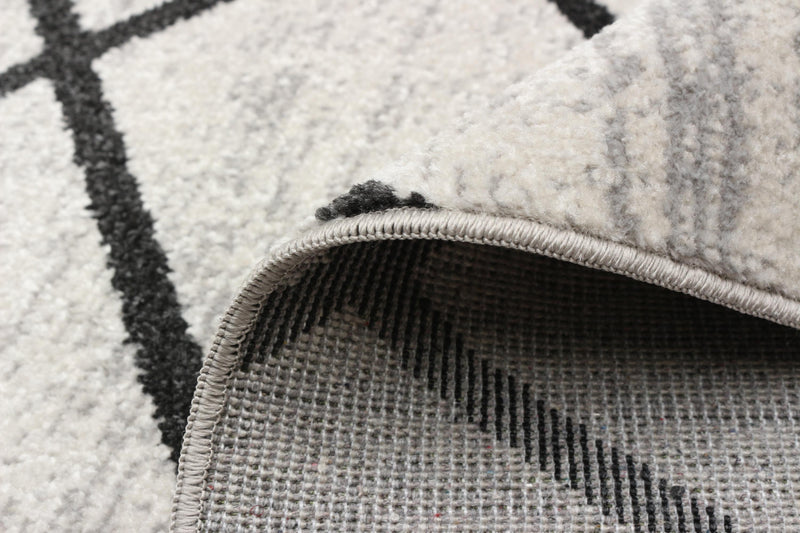 Damali Ivory/Black Machine Washable Area Rug - 2'6\" x 8'0\"